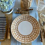 Hand painted wicker plate via Quintessence